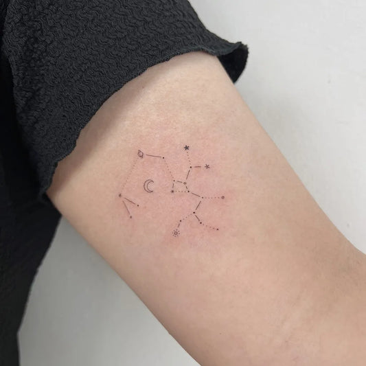 Small Minimalist Constellation Star Tattoo on Women Arm by @tattooist_dante