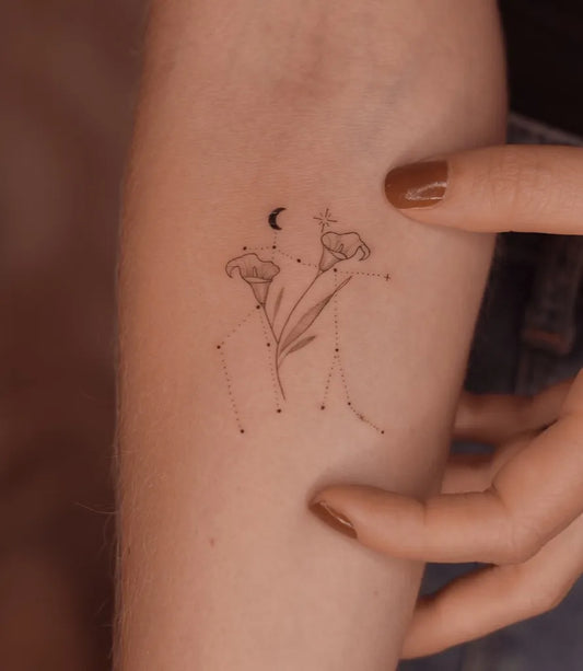 Small Minimalist Crescent Moon Lily Flowers Leo Constellation on Women Arm Tattoo by @pamtattoo_