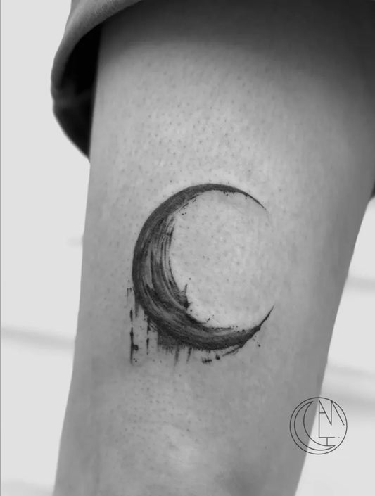 Small Minimalist Crescent Moon Tattoo on Women Arm by @studioluckydubz