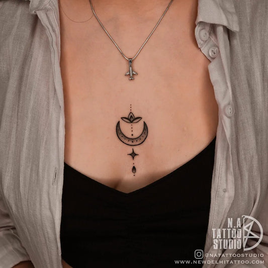 Small Minimalist Crescent Moon and Star on Women Sternum Tattoo by @tattoosbymegha