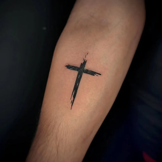 Small Minimalist Cross on Men Arm Tattoo by @abdtattoos