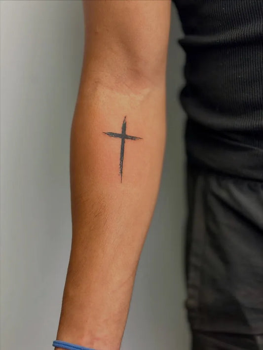 Small Minimalist Cross on Men Forearm Tattoo by @aj_inkvillage