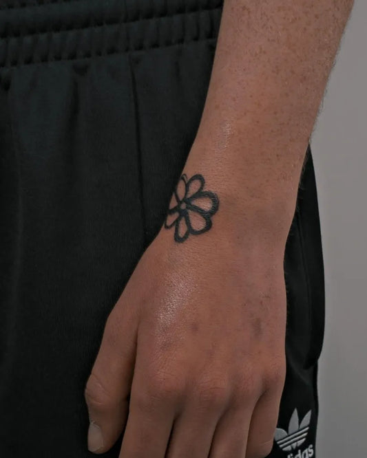 Small Minimalist Dahlia on Men Wrist Tattoo by @saliibaj