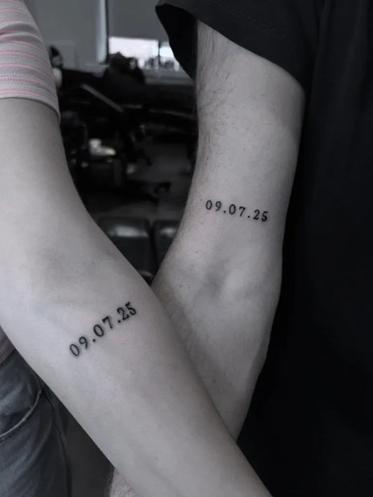 Small Minimalist Date on Couple Arm Matching Tattoo by @molliemactattoo