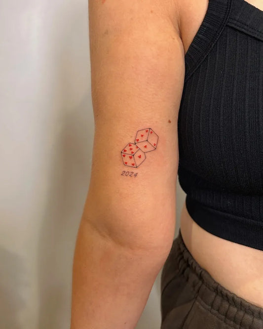 Small Minimalist Dice Tattoo on Women Arm by @tinytatswigan