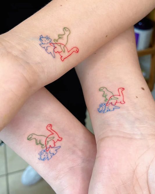 Small Minimalist Dinosaurs on Friends Wrist Matching Tattoo by @arcoiris.tt