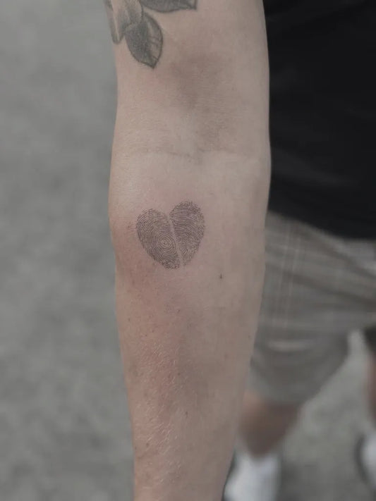 Small Minimalist Dual Heart on Men Arm Tattoo by @tweigelt_