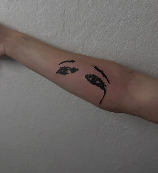 Small Minimalist Eyes on Women Forearm Tattoo by @truejuicy.tattoo