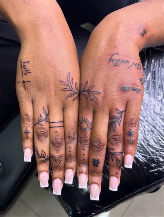 Small Minimalist Faith Cross Laurel on Women Fingers Tattoo by @tattsby.tyy