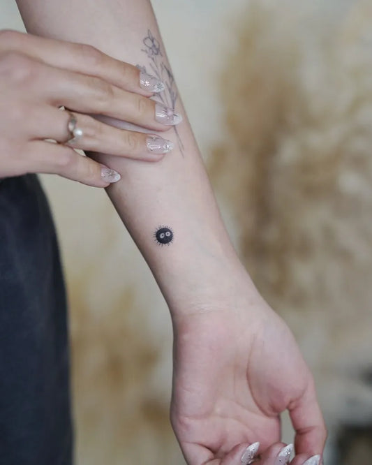 Small Minimalist Flower and Dot on Women Arm Tattoo by @davekulla.tattoo