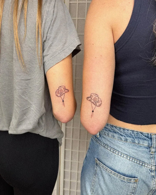 Small Minimalist Flower on Friends Arms Matching Tattoo by @mollypaigetattoos