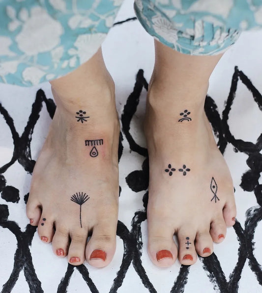 Small Minimalist Geometric Symbols Tattoo on Women Foot by @corrieforeman