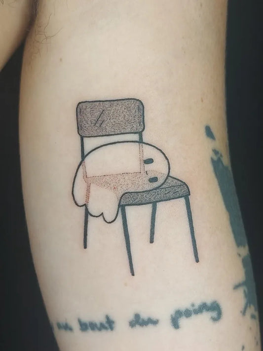 Small Minimalist Ghost on Chair Tattoo on Women Arm by @fulifulitattoo