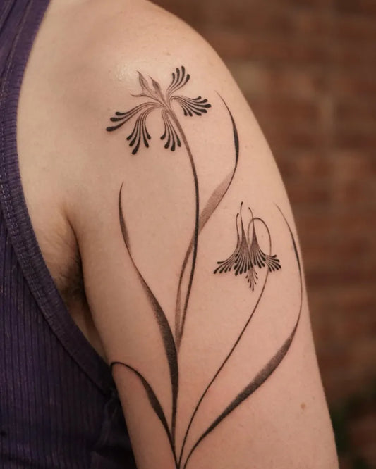 Small Minimalist Iris Flowers on Women Shoulder Flower Tattoo by @solyn_tattooist