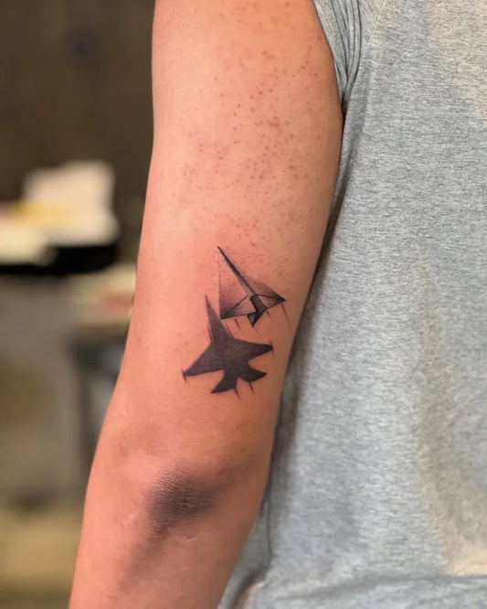 Small Minimalist Jet Silhouettes on Men Arm Tattoo by @temptink_tattoo_studio