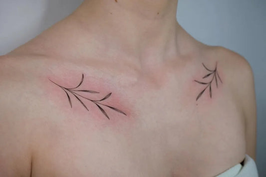 Small Minimalist Leaf Tattoo on Women Collarbone by @mimi_art_tattoo