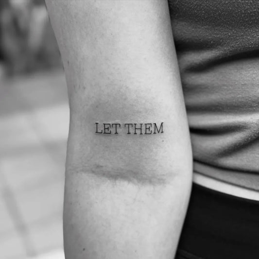 Small Minimalist Let Them Text on Women Arm Tattoo by @trace7711tattoos