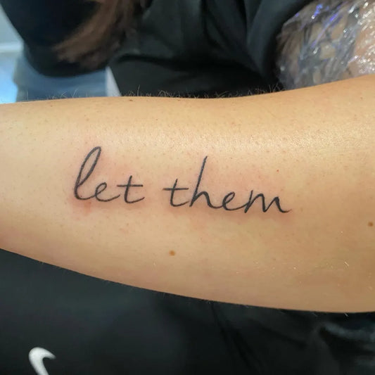 Small Minimalist Let Them on Women Arm Tattoo by @inkedbycora