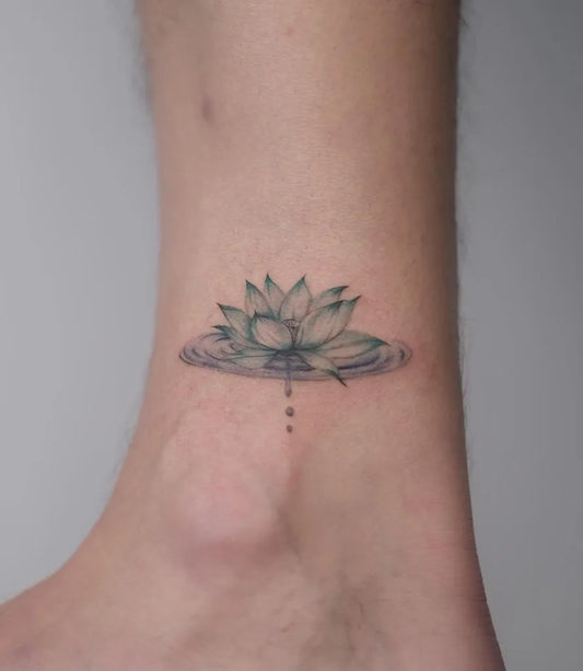 Small Minimalist Lotus Flower with Water Ripples on Women Ankle Tattoo by @inkbymissy