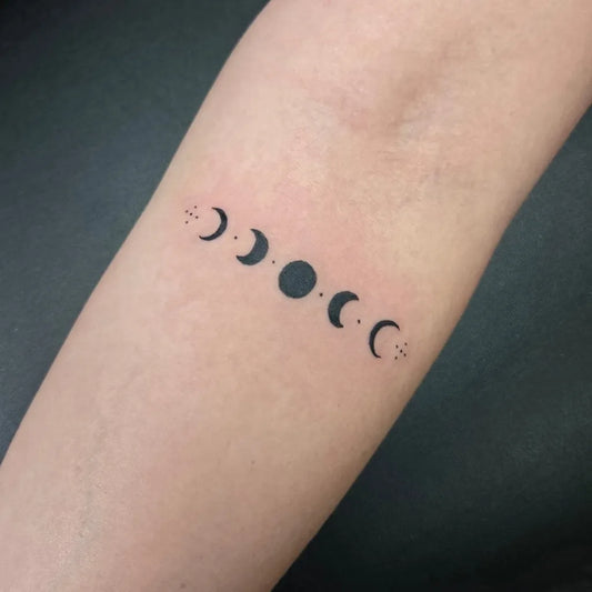 Small Minimalist Moon Phases Tattoo on Women Arm by @_jose_g_p_