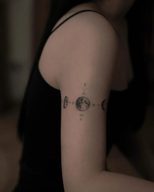 Small Minimalist Moon Phases Tattoo on Women Arm by @chingyuuki