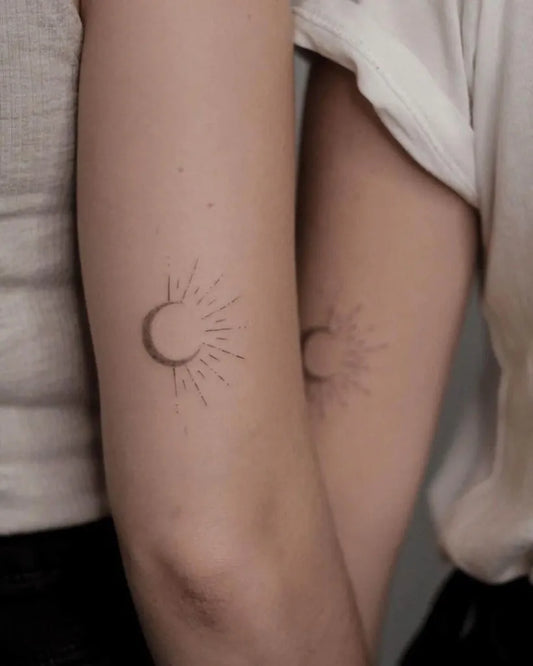 Small Minimalist Moon Phases Tattoo on Women Arm by @inktasticminitattoos