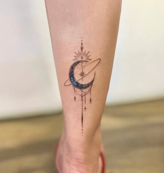 Small Minimalist Moon Saturn Planet Tattoo on Women Ankle by @reenact_tattoo