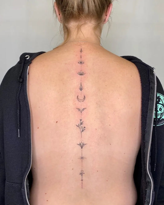 Small Minimalist Moons Flowers on Women Spine Tattoo by @mysticgarden.ink
