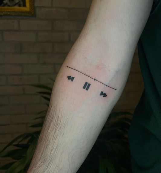 Small Minimalist Music Control Symbols Music Tattoo on Men Arm by @mootatts