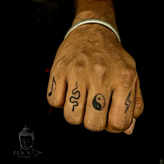 Small Minimalist Music Note Snake Yin Yang Lightning on Men Fingers Tattoo by @zen_x_tattoo_chengalpattu