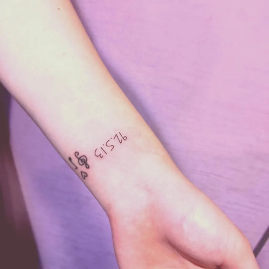 Small Minimalist Music Notes 1516 Tattoo on Women Wrist by @yoyo.tarot