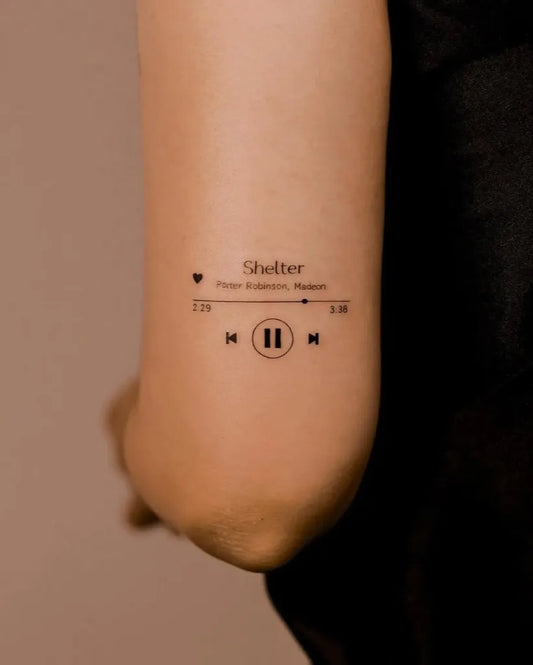 Small Minimalist MusicPlayerShelter on Women Arm Tattoo by @small.tattoos