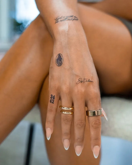 Small Minimalist Name and Number on Women Hand Tattoo by @tiny.tatts