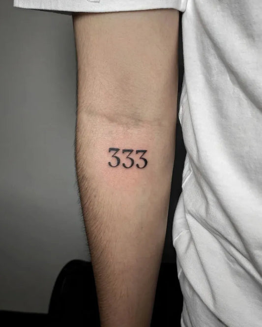 Small Minimalist Number Tattoo on Men Forearm by @omustattoo