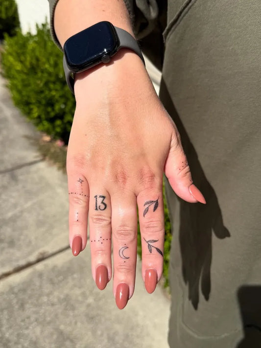 Small Minimalist Numbers Symbols on Women Hand Tattoo by @highvibestattoo