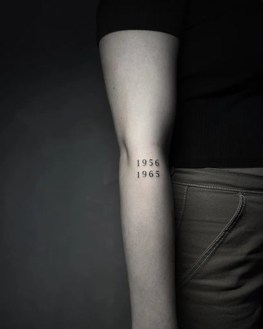 Small Minimalist Numbers Tattoo on Women Forearm by @thefinelinecowboy