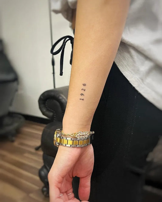 Small Minimalist Numbers on Women Arm Tattoo by @jeffrainsofficial