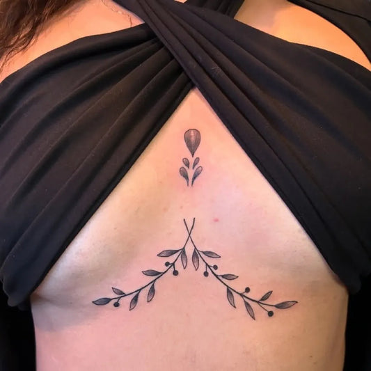 Small Minimalist Olive Branch on Women Sternum Tattoo by @eve_inkked