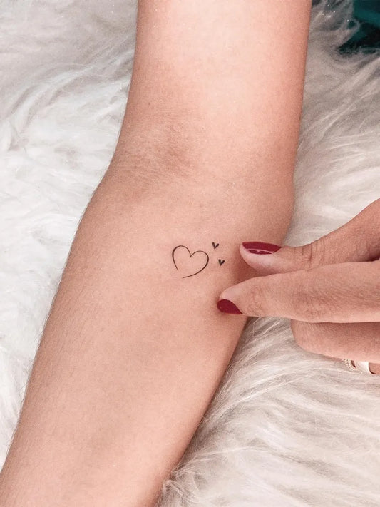 Small Minimalist Open Heart Dots on Women Arm Tattoo by @jessy_tattooer
