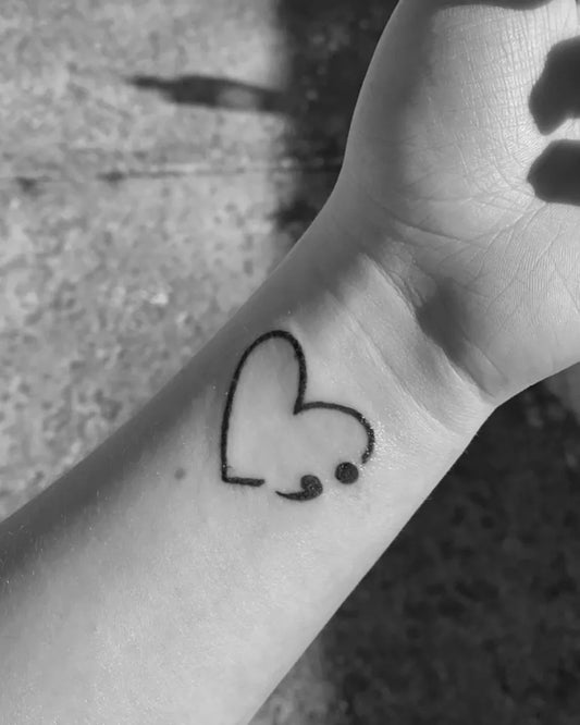 Small Minimalist Outline Heart Semicolon on Women Wrist Tattoo by @kamerin.workman