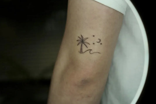 Small Minimalist Palm Tree Wave Stars Tattoo on Women Arm by @gowa_tattoo