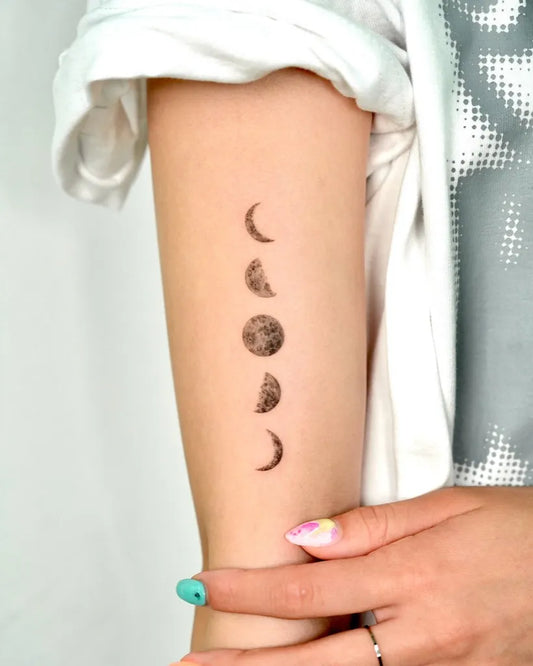 Small Minimalist Phases Moon Tattoo on Women Arm by @tattooist_gaon