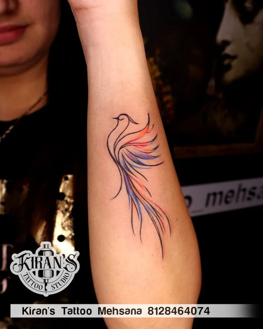 Small Minimalist Phoenix on Women Arm Tattoo by @kirans_tattoo_mahesana