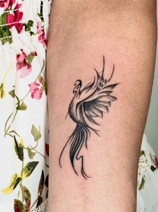 Small Minimalist Phoenix on Women Arm Tattoo by @tattoosbyalice