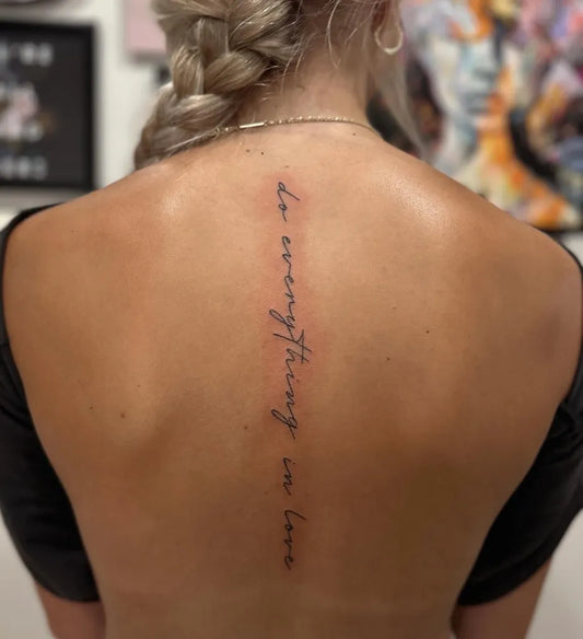 Small Minimalist Quote on Women Spine Tattoo by @the.asylum.ink