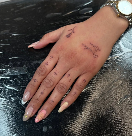 Small Minimalist Rose Dots Script on Women Fingers Tattoo by @sydsmithhh