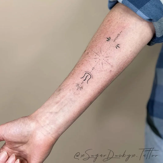 Small Minimalist Runes and Mandala Spiritual Tattoo on Women Arm by @xsugarduckyx.tattoo