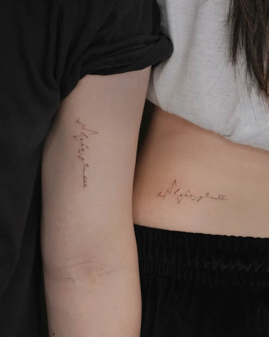 Small Minimalist Script on Couple Arm and Hip Matching Tattoo by @miko_nyctattoo