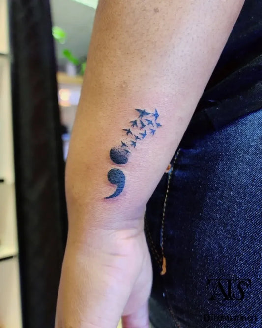 Small Minimalist Semicolon Birds on Women Arm Tattoo by @assaritattoostudio