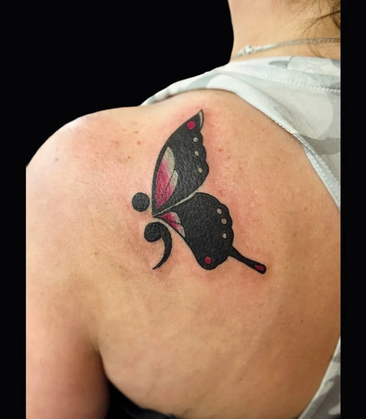 Small Minimalist Semicolon Butterfly on Women Shoulder Tattoo by @inkedbotanical
